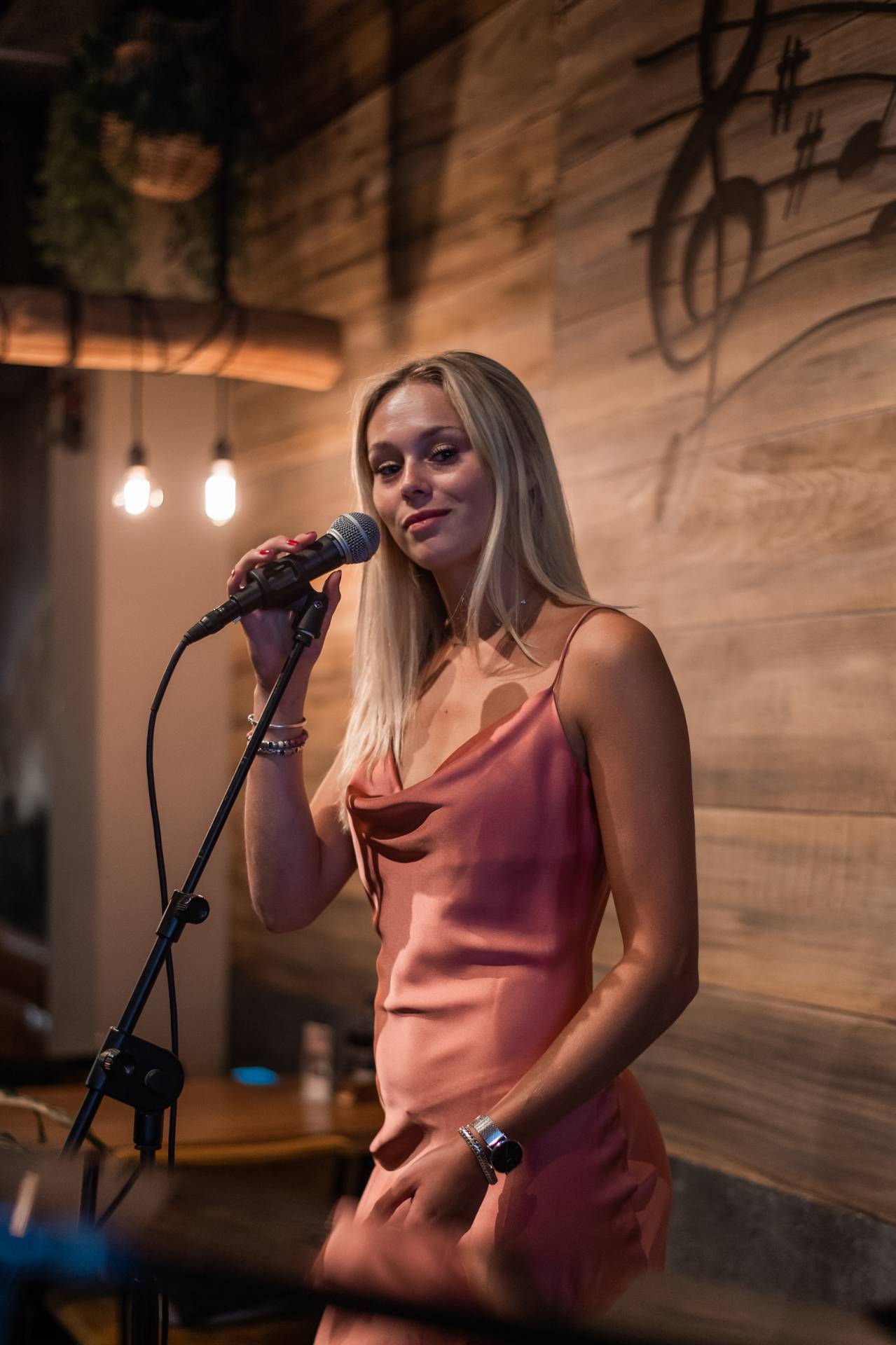 Mascha performing with microphone